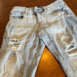 Hollister Stacked Super Skinny jeans with tears